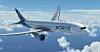 A Norse Atlantic Airways passenger jet in flight above clouds against a blue sky.