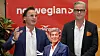 Petter Stordalen and Magnus Wikner stand in front of a Norwegian-branded press conference backdrop.