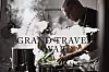 Chef Stefan Eriksson prepares food beside steaming cookware under a Grand Travel Award 2027 graphic.